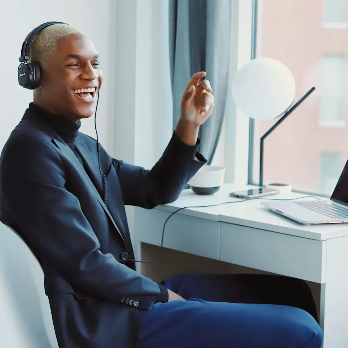 A man working in front of a computer